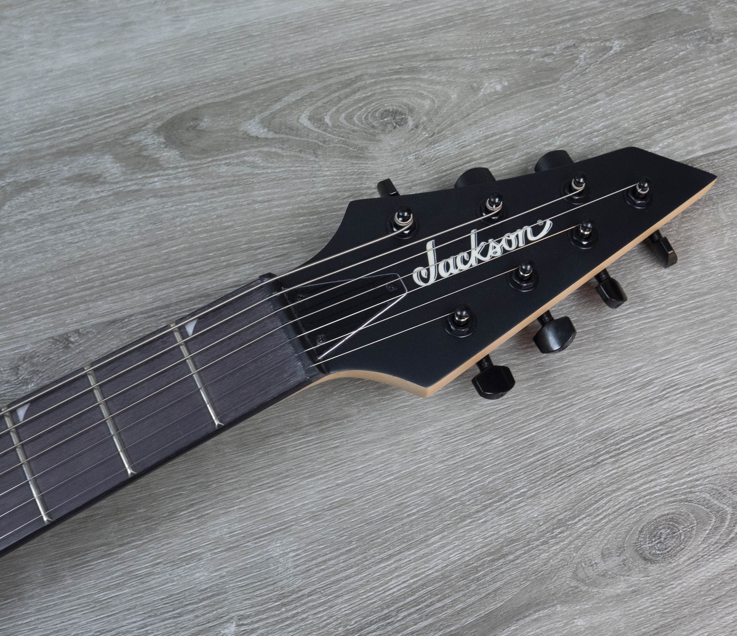 Jackson JS Series King V JS22-7 KV HT, diapasón de amaranto, negro