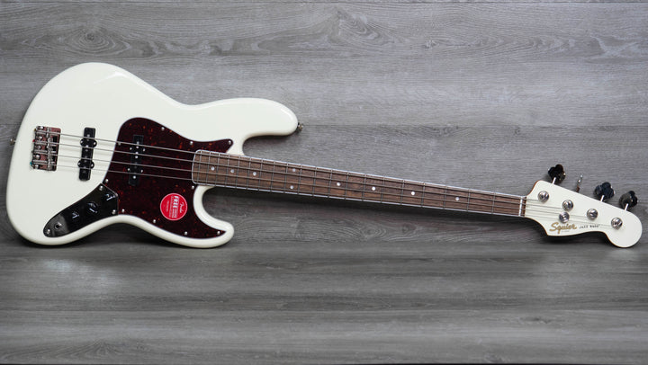 Squier Édition limitée Classic Vibe Mid-'60s Jazz Bass, touche en laurier, pickguard écaille de tortue, Olympic White 