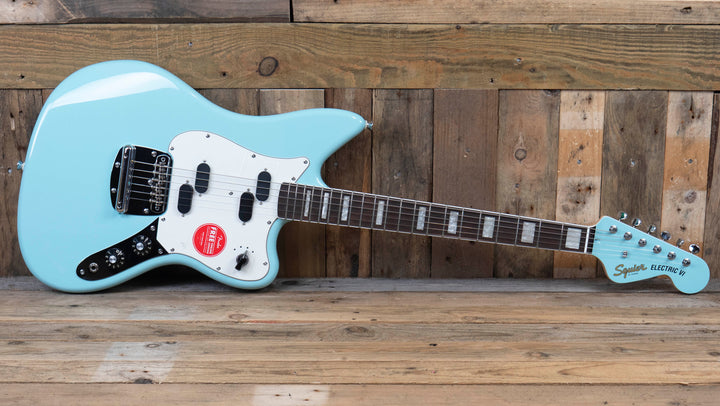 Squier Paranormal Electric VI, Laurel Fingerboard, Parchment Pickguard, Matching Headstock, Daphne Blue