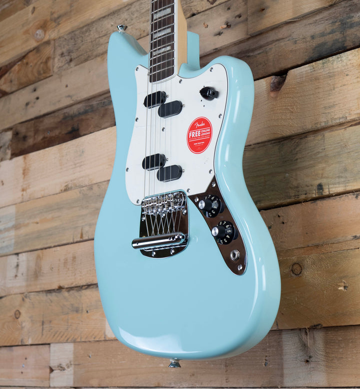 Squier Paranormal Electric VI, Laurel Fingerboard, Parchment Pickguard, Matching Headstock, Daphne Blue