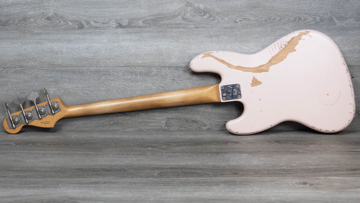 Fender Flea Jazz Bass, touche en palissandre, coque rose usée