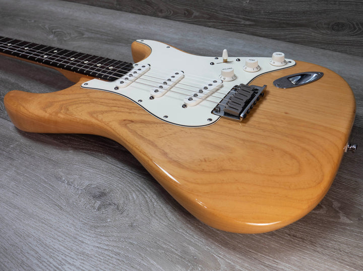 Fender American Deluxe HSS Stratocaster d'occasion, couleur ambre