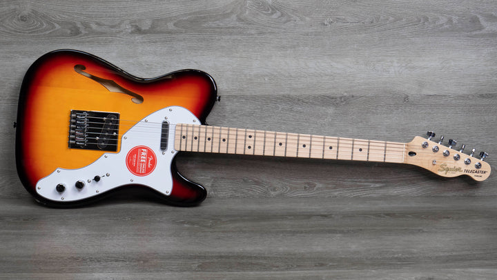 Squier Affinity Series Telecaster Thinline, diapasón de laurel, golpeador blanco, Sunburst de 3 colores