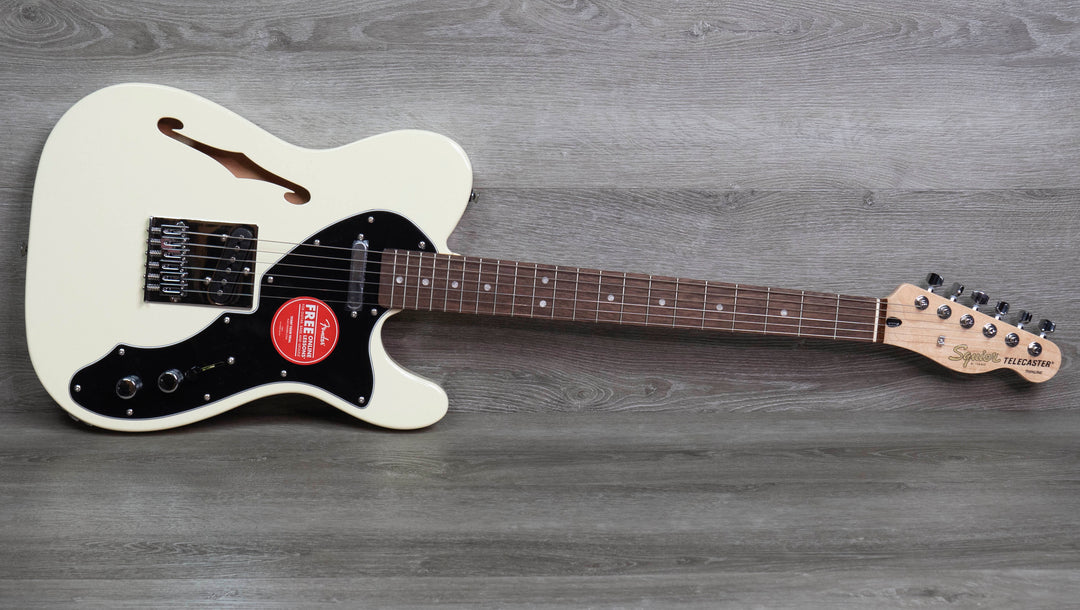 Squier Affinity Series Telecaster Thinline, diapasón de laurel, golpeador negro, blanco olímpico