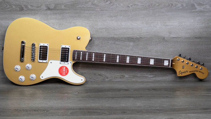 Squier Edición limitada Paranormal Troublemaker Telecaster Deluxe, diapasón de laurel, golpeador de pergamino, oro azteca