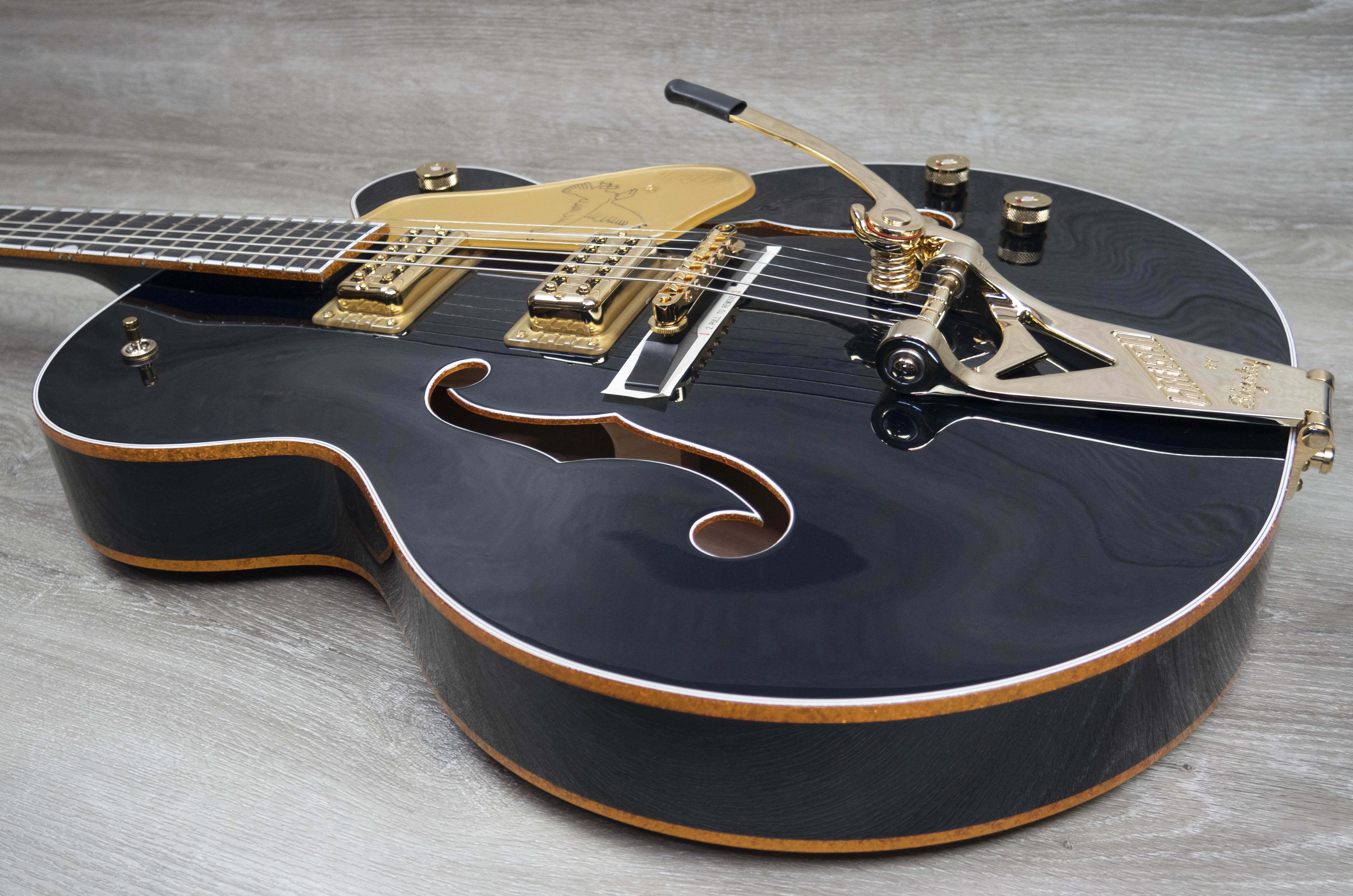 Gretsch G6136TG Players Edition Falcon Hollow Body with String Thru Bigsby and Gold Hardware Ebony Fingerboard Midnight Sapphire